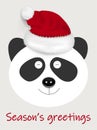 Handmade greeting vector card / banner of a panda with realistic sewing buttons and santa`s hat and Seasons greetings lettering